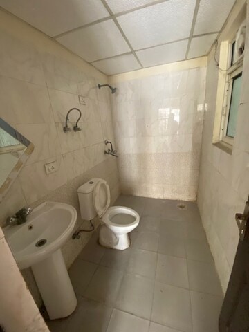 Bathroom in 3 BHK Apartment at Gardenia Golf City, Sector 75 – for Sale