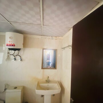 Bathroom in 3 BHK Apartment at Mahagun Moderne, Sector 78 – for Rent