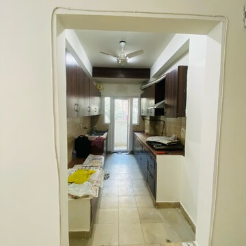 Kitchen in 3 BHK Apartment at Mahagun Moderne, Sector 78 – for Rent