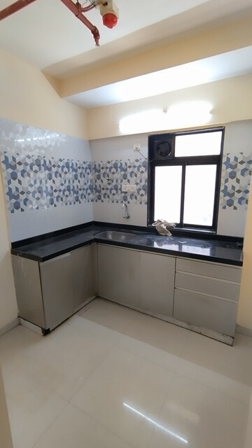 Kitchen in 1 BHK Apartment at Raunak City Sector 4, Kalyan West – for Sale