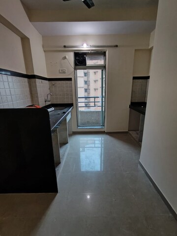 Kitchen in 1 BHK Apartment at Vijay Nagari Annex, Waghbil – for Rent