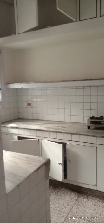 Kitchen in 2 BHK Apartment at Maj Udai Apartment, Sector 29 – for Rent