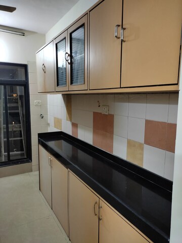 Kitchen in 2 BHK Apartment at Sai Gunina Apartment, Sanpada – for Rent