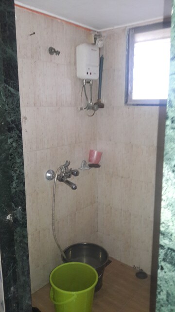 Bathroom in 1 BHK Apartment at Vasundhara CHS Gokuldham, Gokuldham Colony – for Rent