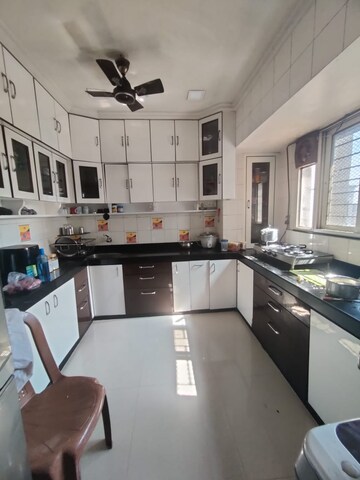 Kitchen in 2 BHK Apartment at Orchid Enclave CHS, Andheri East – for Rent