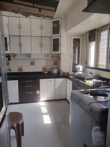 Kitchen in 2 BHK Apartment at Orchid Enclave CHS, Andheri East – for Rent