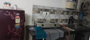 Kitchen in Studio Apartment at Sushma Elite Cross, Dhakoli Village – for Rent