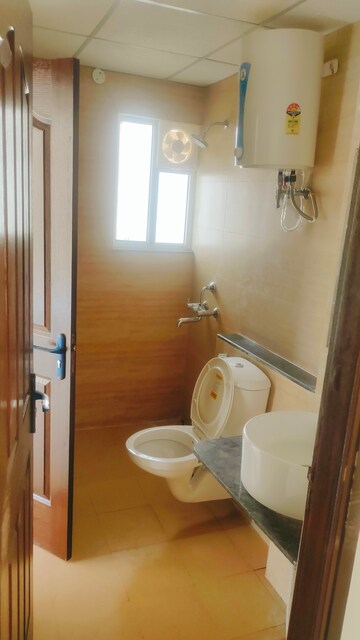 Bathroom in 3 BHK Apartment at Sushma Elite Cross, Dhakoli Village – for Rent