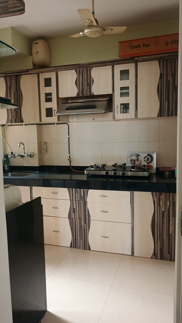 Kitchen in 2 BHK Apartment at Renaissance Tower, Andheri West – for Rent