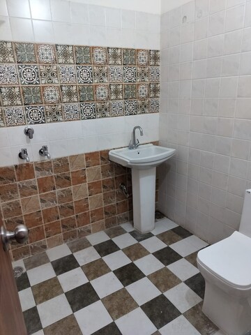 Bathroom in 2 BHK Apartment at Shri Devaji Residency, Dhakoli Village – for Rent
