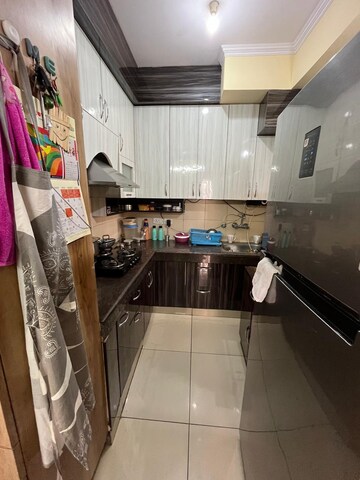 Kitchen in 3.5 BHK Apartment at Amrapali Heartbeat City, Sector 107 – for Sale