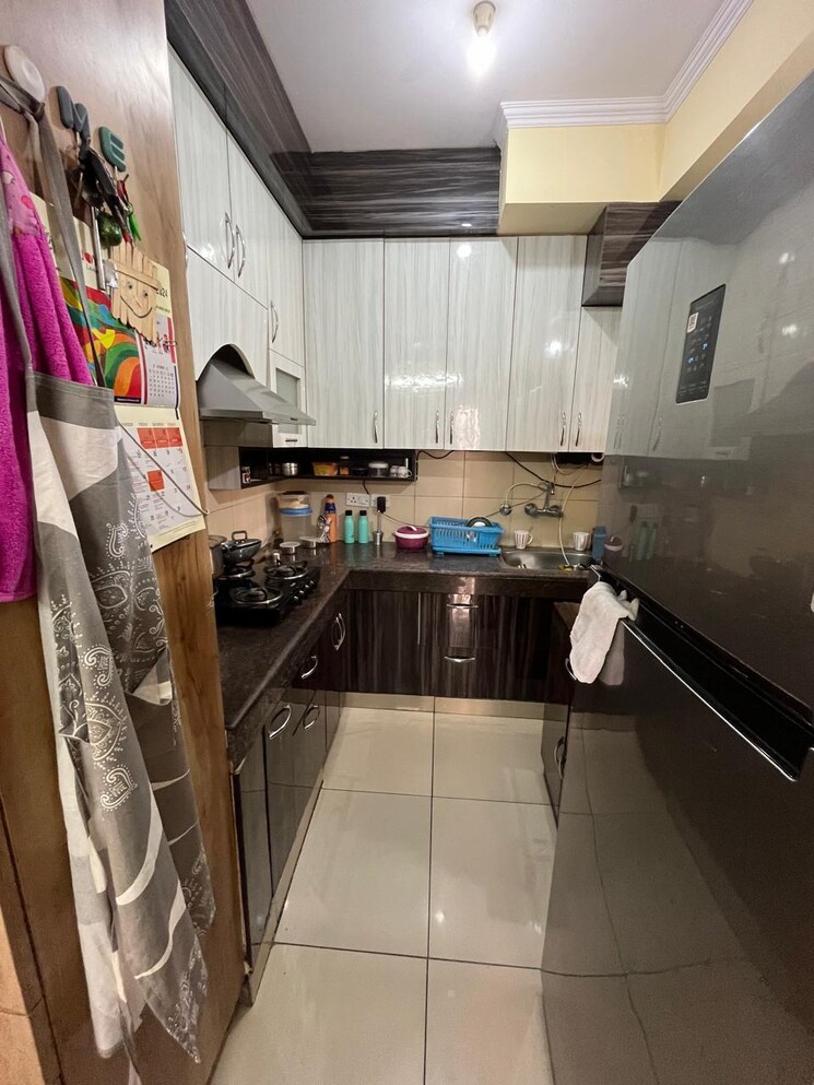 Kitchen, amrapali-heartbeat-city 3.5 Bedroom 1735 Sq.Ft. Apartment In Sector 107 Noida 8003904