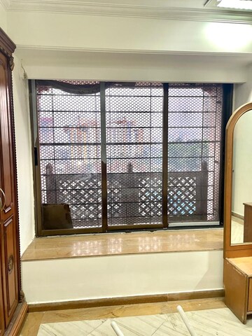 Bedroom in 3 BHK Apartment at Soham Garden, Manpada – for Rent