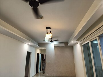 Living Room in 2.5 BHK Apartment at Mahagun Mirabella, Sector 79 – for Rent