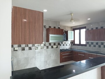Kitchen in 4 BHK Apartment at Mahagun Medalleo, Sector 107 – for Sale