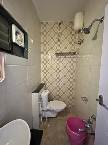 Bathroom in 1 BHK Apartment at Sunteck Maxxworld, Naigaon East – for Rent