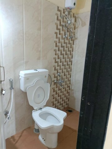 Bathroom in 1 BHK Apartment at Sunteck West World, Naigaon East – for Rent