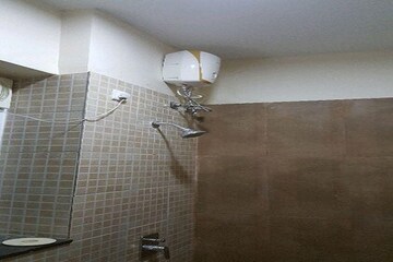 Bathroom in 3 BHK Apartment at Runwal Greens, Mulund West – for Rent