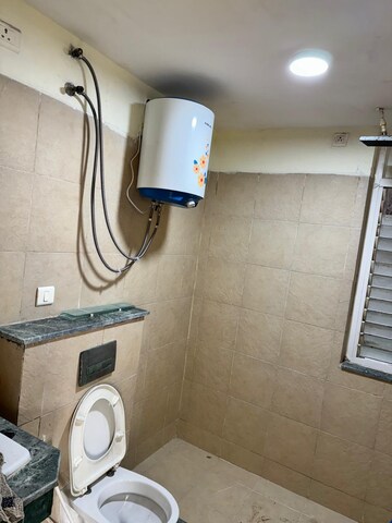 Bathroom in 3 BHK Apartment at Puri Pranayam, Sector 82 – for Rent