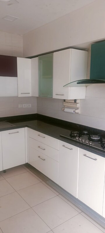 Kitchen in 5 BHK Apartment at Tata Raheja Raisina Residency, Sector 59 – for Sale