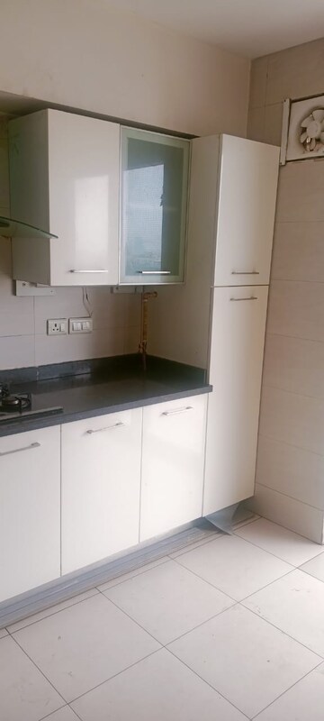 Kitchen in 5 BHK Apartment at Tata Raheja Raisina Residency, Sector 59 – for Sale