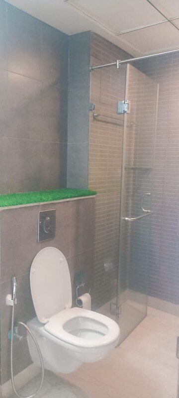 Bathroom in 5 BHK Apartment at Tata Raheja Raisina Residency, Sector 59 – for Sale
