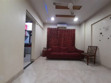 Living Room in 1 BHK Apartment at Royal Palms, Goregaon East – for Rent