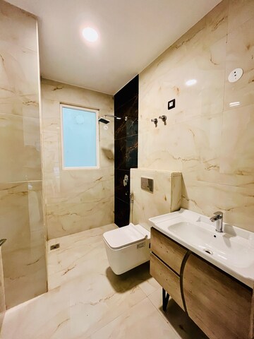 Bathroom in 4 BHK Builder Floor at Ansal API Versalia, Sector 67a – for Sale