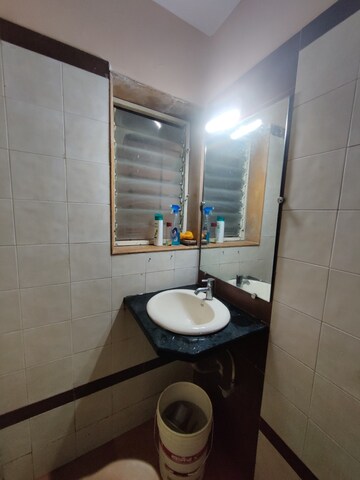 Bathroom in 2 BHK Apartment at Dedhia Palatial Height, Powai – for Rent