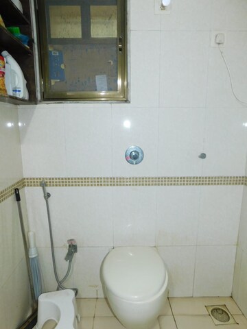 Bathroom in 2 BHK Apartment at Dedhia Palatial Height, Powai – for Rent