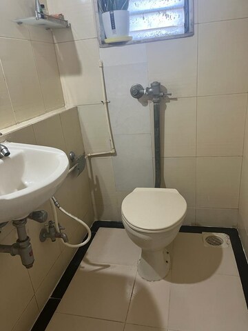 Bathroom in 2 BHK Apartment at Dedhia Palatial Height, Powai – for Rent