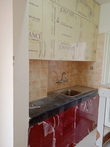 Kitchen in 2 BHK Apartment at Ramprastha Awho, Sector 95 – for Sale