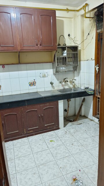 Kitchen in 3 BHK Apartment at Vasundhara Enclave – for Sale