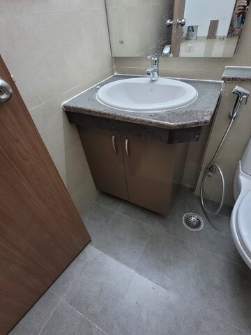 Bathroom in 3 BHK Apartment at ATS Homekraft Pious Hideaways, Sector 150 – for Rent