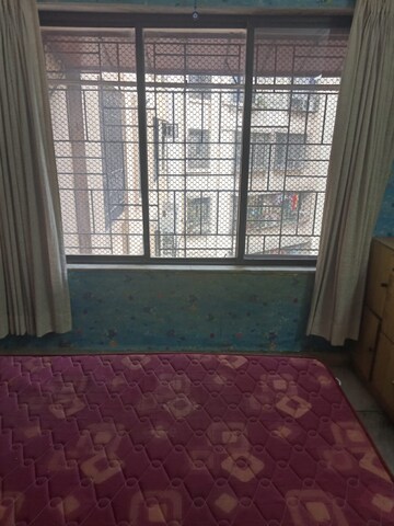 Bedroom in 1 BHK Apartment at Blooming Heights, Powai – for Rent