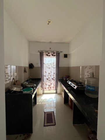 Kitchen in 1 BHK Apartment at Lodha Palava City Lakeshore Greens, Dombivli East – for Rent