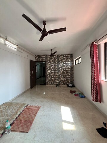 Living Room in 1 BHK Apartment at Lodha Palava City Lakeshore Greens, Dombivli East – for Sale