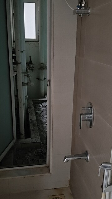 Bathroom in 3 BHK Apartment at Conwood Enclave, Vasant Vihar – for Rent
