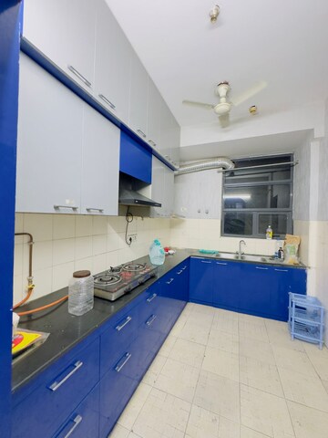 Kitchen in 3 BHK Apartment at Mahagun Mezzaria, Sector 78 – for Rent