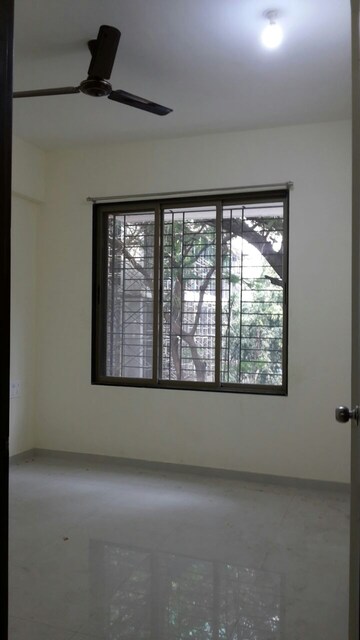 Room in 2 BHK Apartment at Kalpataru Aura, Ghatkopar West – for Rent
