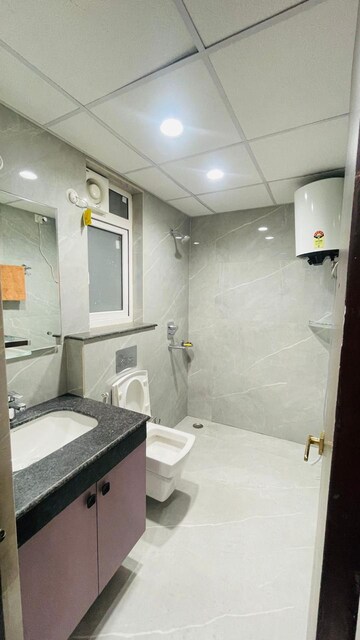 Bathroom in 3 BHK Apartment at Rishita Manhattan, Gomti Nagar – for Rent