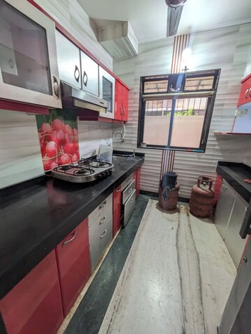 Kitchen in 2 BHK Apartment at Godrej Carnation CHS, Kalyan West – for Rent