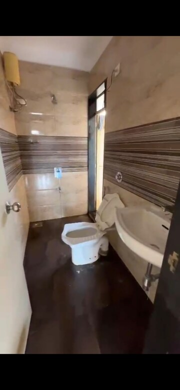 Bathroom in 3 BHK Apartment at Nisarg Hyde Park, Kharghar – for Rent