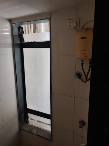 Kitchen in 1 BHK Apartment at Raunak Delight, Owale – for Rent