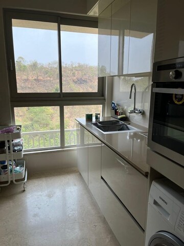 Kitchen in 2 BHK Apartment at Castle Rock, Powai – for Rent