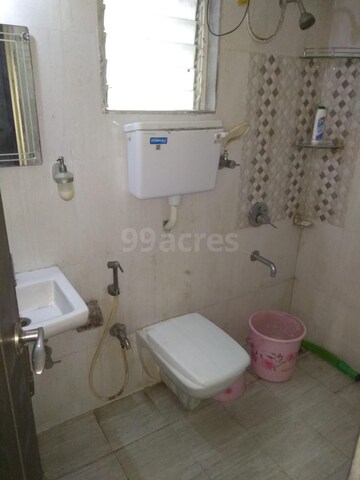 Bathroom in 1 BHK Apartment at Raunak Delight, Owale – for Rent