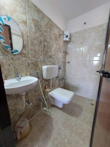 Bathroom in 1 BHK Apartment at Raunak Delight, Owale – for Rent