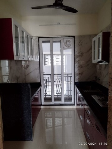 Kitchen in 3 BHK Apartment at Paradise Sai World Empire, Kharghar – for Rent