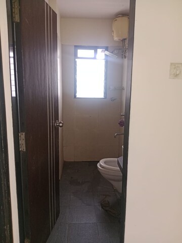 Bathroom in 1 BHK Apartment at Raunak Delight, Owale – for Rent