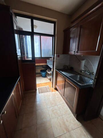 Kitchen in 3.5 BHK Apartment at Unitech Palms, South City 1 – for Rent